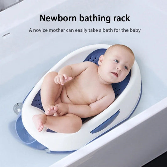Royal blue baby bath with spine protection design measuring 66cm long with TPE soft edges