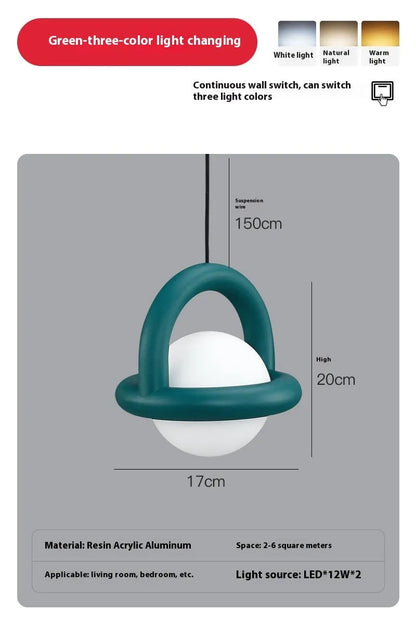 Danish designer hanging line lamp with adjustable cord and matte finish in bedside setting