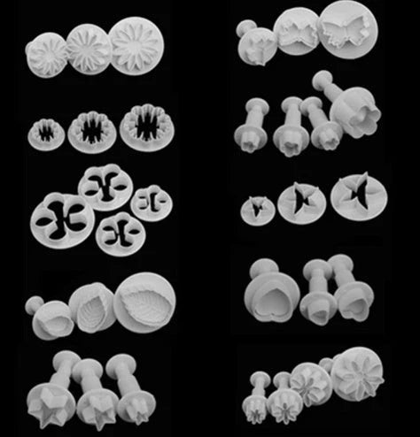 A set of premium cake decorating tools including plungers and knives for creating beautiful flower and shape designs on cakes and baked goods
