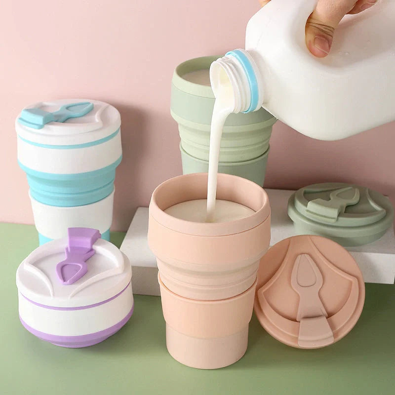 Collapsible silicone travel mug with leak-proof cover in various colors