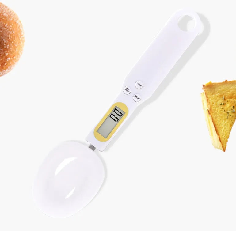 Black electronic measuring spoon scale showing digital display with spoon bowl for kitchen weighing