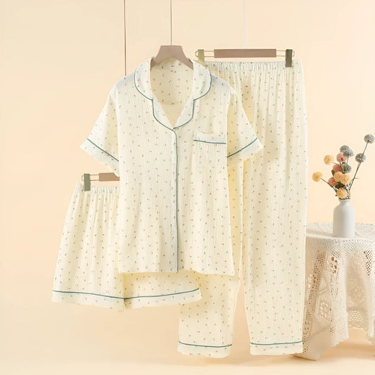 Garden gold cotton pajama set with lapel collar and short sleeves on a hanger.
