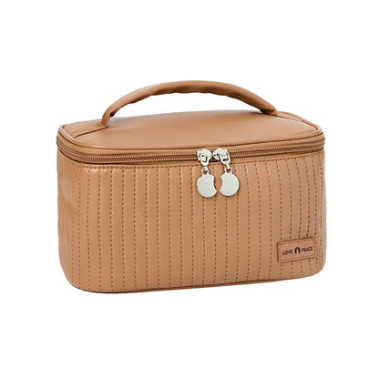 Open-top cake makeup bag in six colour options with PU leather construction and 20cm dimensions