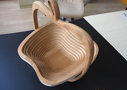 Folding natural bamboo fruit basket open at 27 cm wide, 30 cm high, collapsed to 1.8 cm for storage
