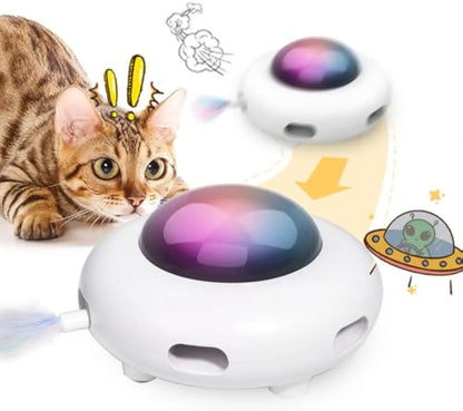 White automatic cat toy with colourful feathers and cleaning ring attachment on floor