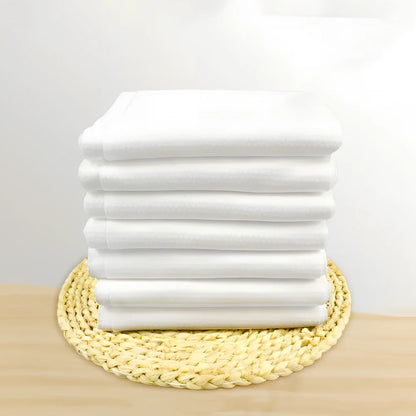 Pack of non-woven disposable bath towels 65x135cm with pearl pattern for absorbent drying