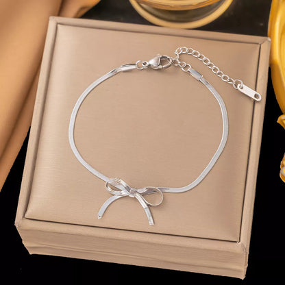 Trendy bowknot stainless steel gold plated snake chain necklace for women