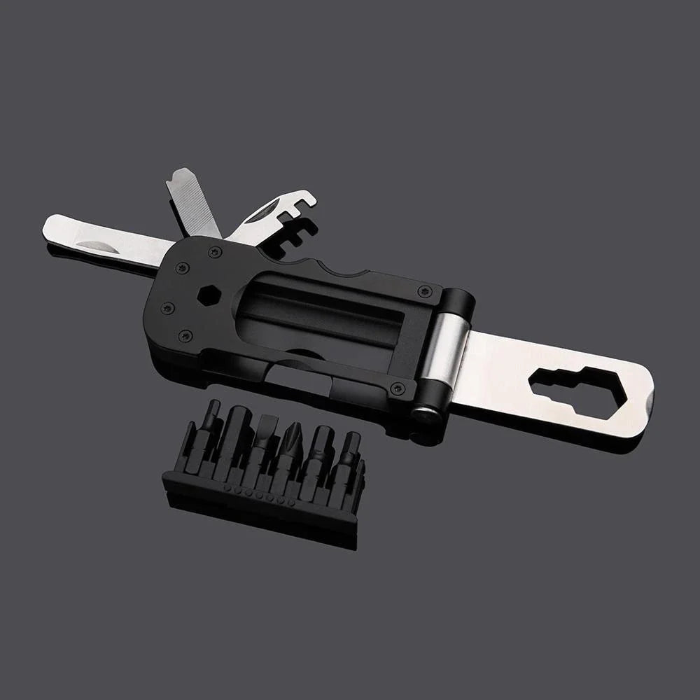 Compact, multi-function bicycle repair tool with wrench, tire spoon, and venting cap tools