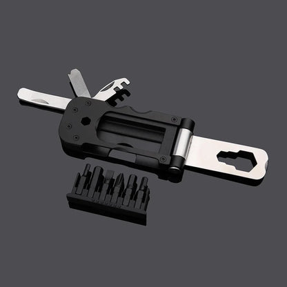 Compact, multi-function bicycle repair tool with wrench, tire spoon, and venting cap tools