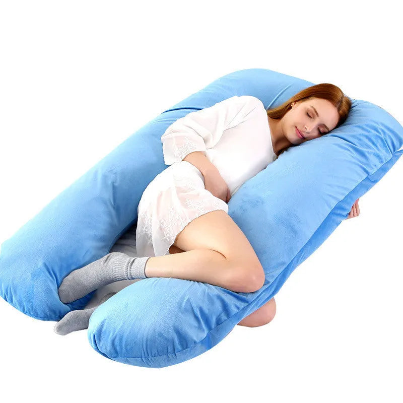 Large U-shaped pregnancy support pillow with removable cover and abdominal support belt.