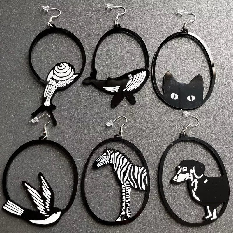 Black acrylic dangle earrings featuring unique animal and zodiac designs, lightweight and stylish.