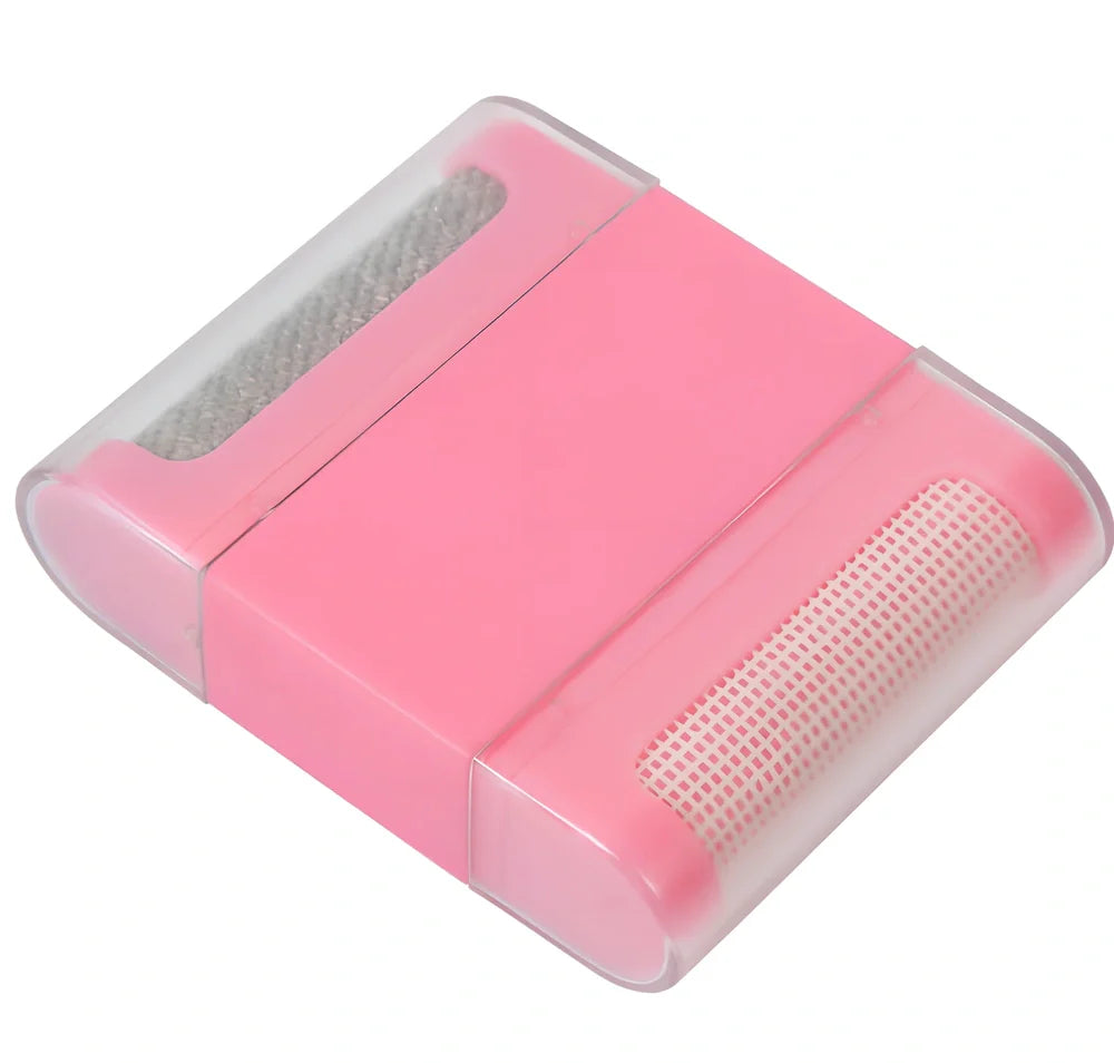 Portable manual fabric cleaning brush with removable catching net, 6.4 cm wide plastic construction