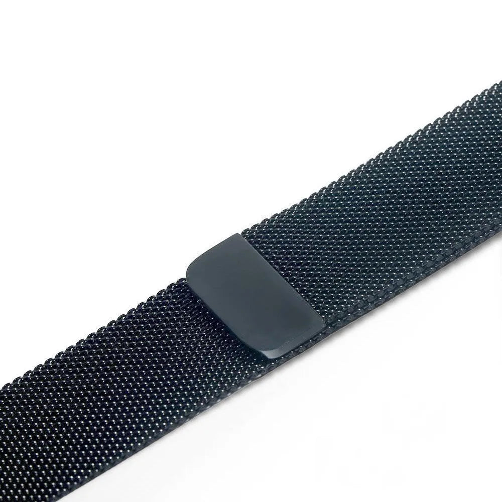 Stainless steel metal link strap for Apple Watch on a wrist, showing deployment clasp and polished finish