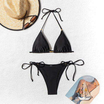 Black women's bikini swimsuit with metal bead detailing on split design, polyester construction