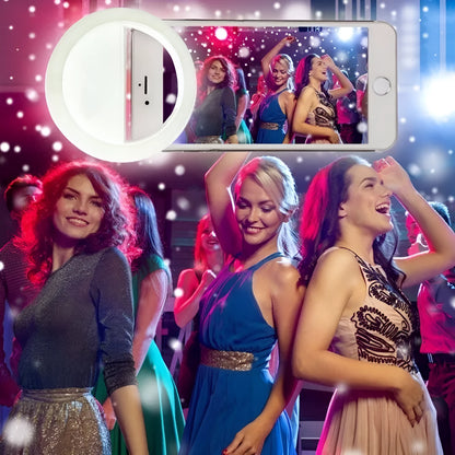 Green clip-on selfie ring light attached to mobile phone with anti-slip sponge visible