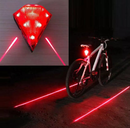 USB rechargeable bicycle tail light with laser safety feature in red and blue