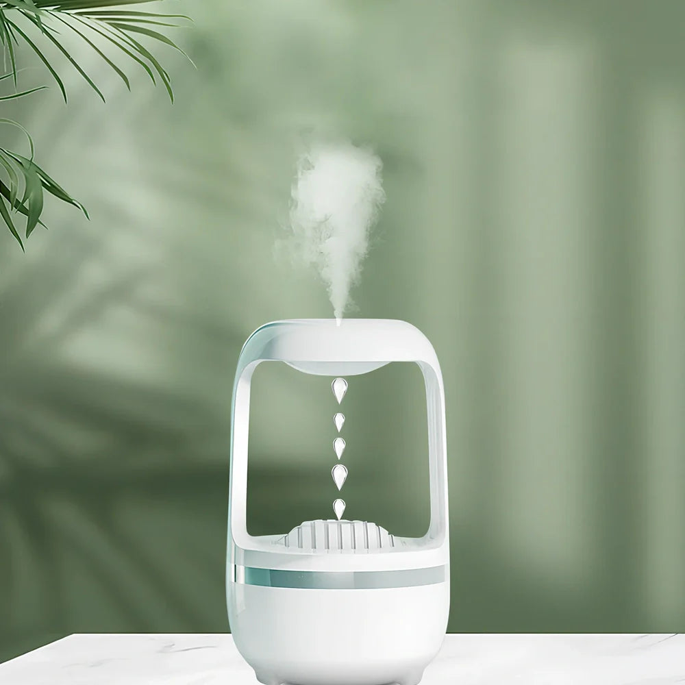 White anti-gravity humidifier showing upward water droplets with 500ml tank and USB-C cable