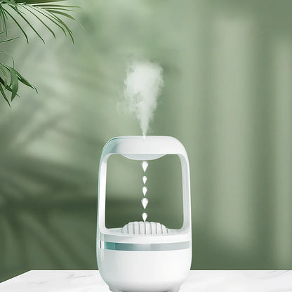 White anti-gravity humidifier showing upward water droplets with 500ml tank and USB-C cable
