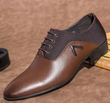 Men's black Oxford shoes with a polished PU upper and durable rubber sole on a wooden floor.