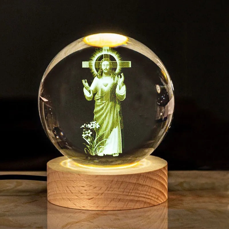 White crystal ball ornament with solid wood warm light base, showing purity engravings like Cross and Maria for desk decor