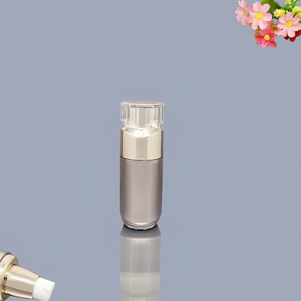 Acrylic cosmetics bottles in champagne gold and brushed white with vacuum sealing, various sizes from 5g to 120ml