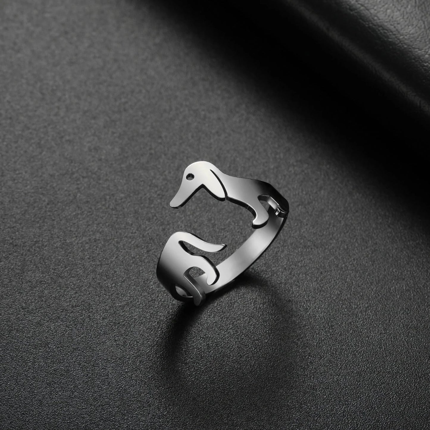 Adjustable Titanium Steel Sausage Dog Ring, a unique fashion accessory with a playful dog-inspired design made of premium materials