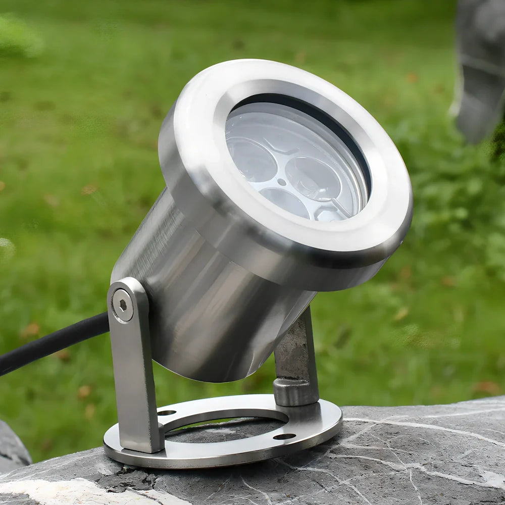 Silver LED underwater spotlights with 3 lamp beads showing 30-degree beam angle illumination in pool water