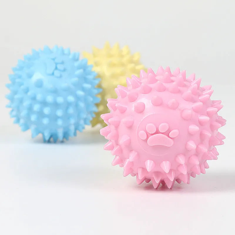 Blue TPR dog chewing toy ball with footprint design and tooth-cleaning bulges