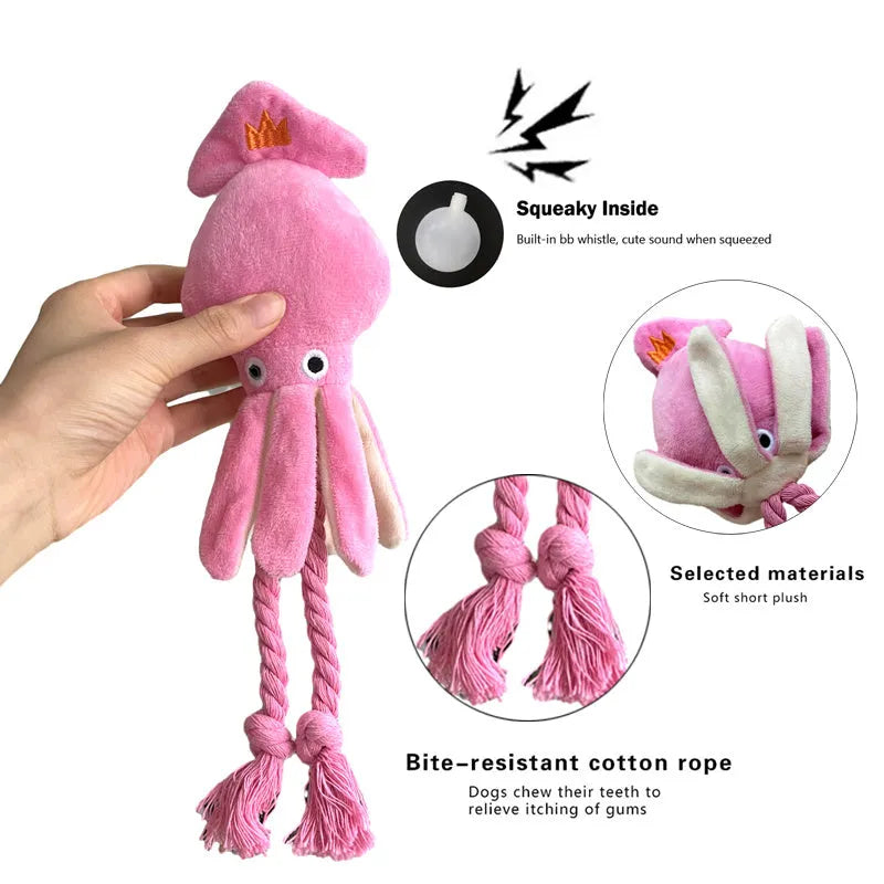 Pink squid-shaped corduroy plush dog toy with rope-like tentacles