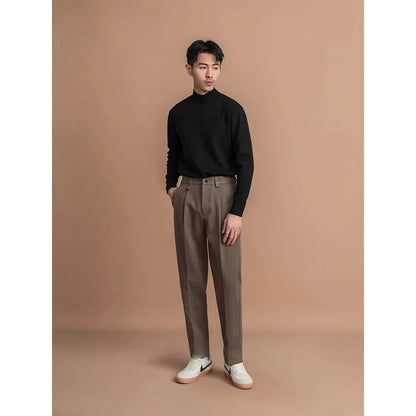 Man wearing straight cut draped polyester casual trousers in dark grey