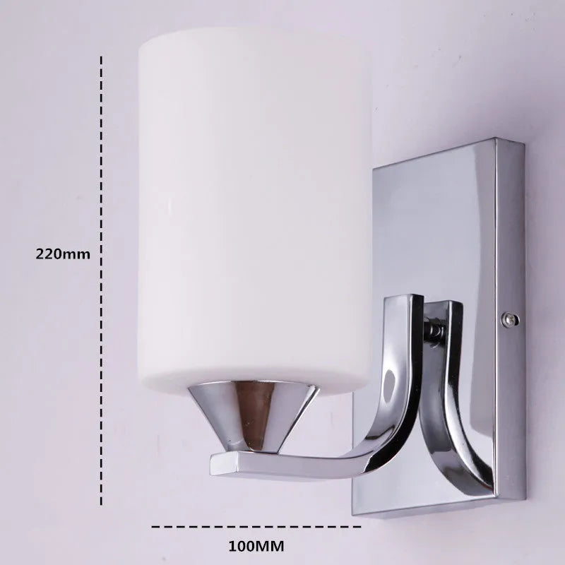 Minimalist chrome glass wall lamp with adjustable light colours for bedside illumination
