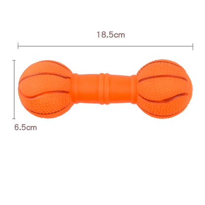 Brown, orange, white, and yellow PVC football dumbbell squeaky dog chew toy.