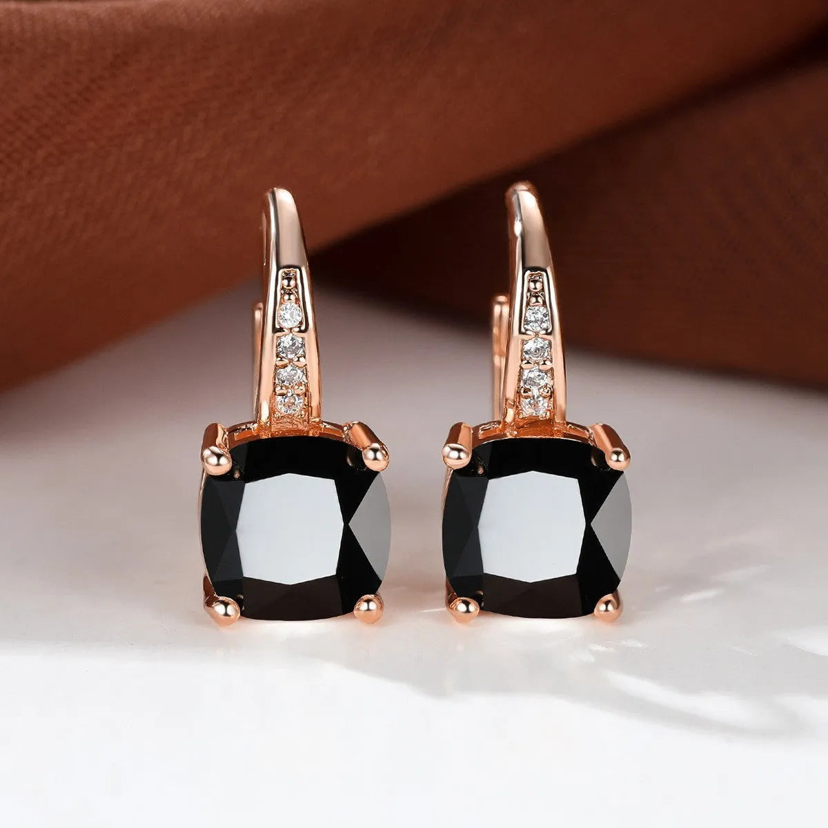 Square zircon inlaid ear hook earrings with geometric design and electroplated finish in golden tone