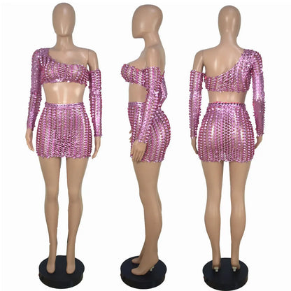 Women's black hollow-out net sleeveless top and short skirt two-piece set.