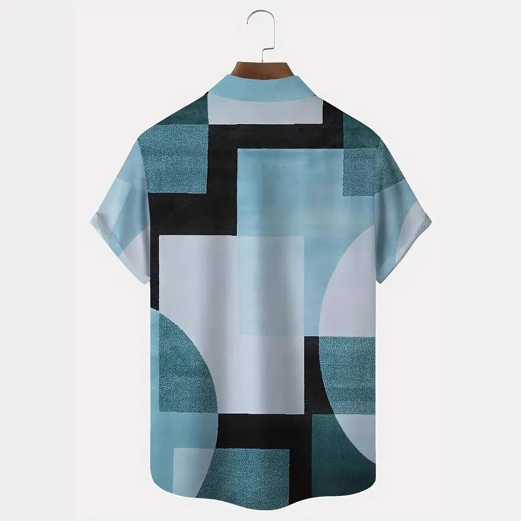 Man wearing a loose-fit short sleeve cardigan shirt with a retro geometric square pattern in contrasting colours.