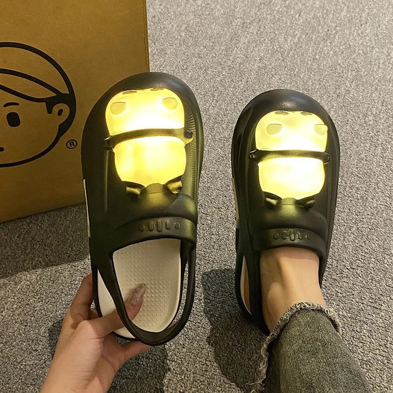 Cozy Panda Night Light Slippers with a charming panda design, built-in night light, and comfortable EVA construction