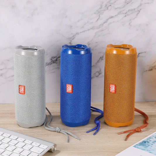 Fabric portable Bluetooth speaker with card holder in blue colour showing compact 182×73.5×69.2mm dimensions
