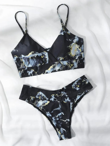 Women's high-waist bikini set with U-neck top in a blue marble tie-dye print.