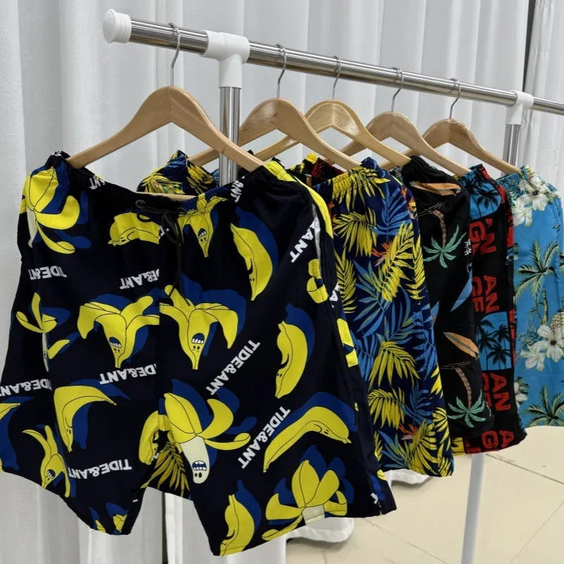 Men's summer beach pants in loose casual fit featuring quick-drying ice silk fabric with high elasticity, designed for a comfortable fit across a weight range of 55kg to 95kg in a variety of stripe and floral print patterns.