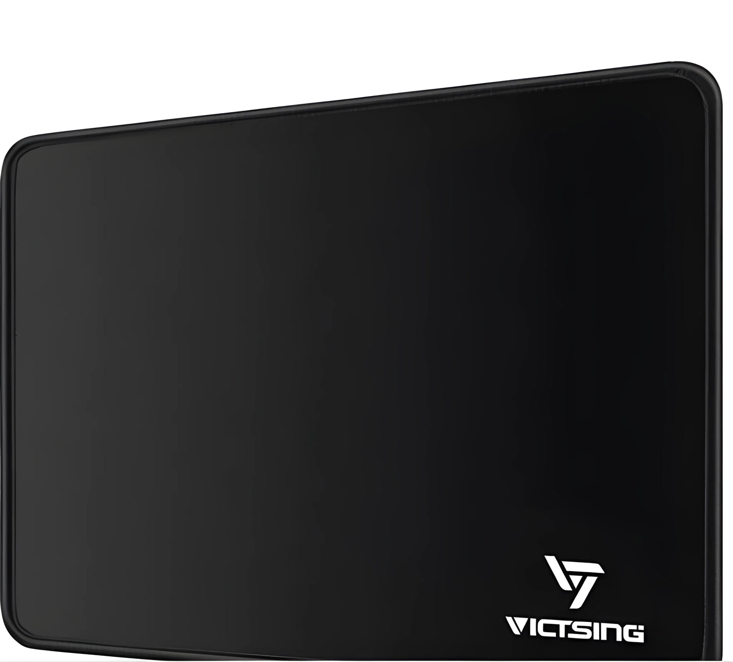 Large black thickened rubber mouse pad with a rough grain texture on a desk.
