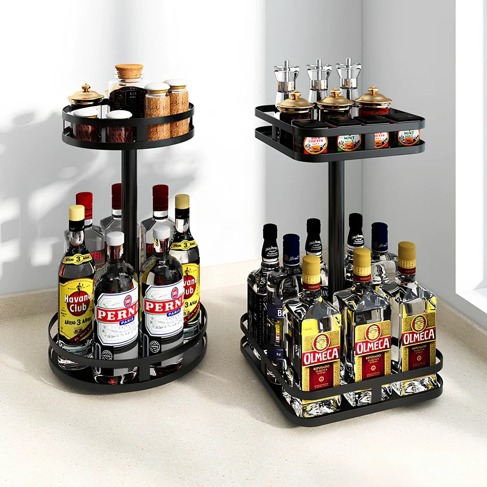 Stainless steel rotating spice rack with two tiers holding 12 bottles on kitchen countertop