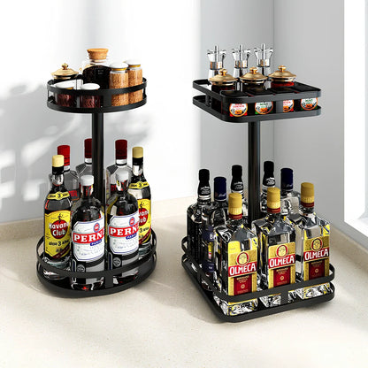 Stainless steel rotating spice rack with two tiers holding 12 bottles on kitchen countertop