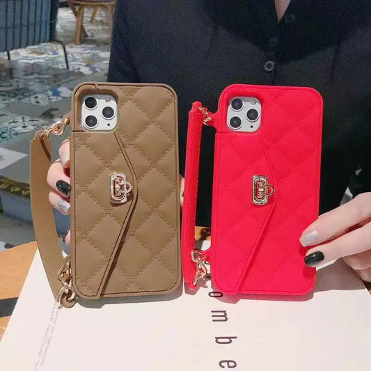 Luxury women's silicone iPhone case with pearl chain lanyard in beige, black, green, khaki, pink, or white