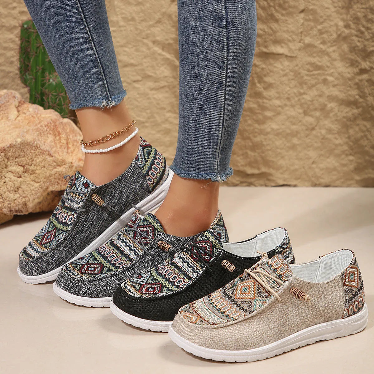 Women's black round toe flat shoes with low-top design and elasticated oversleeves