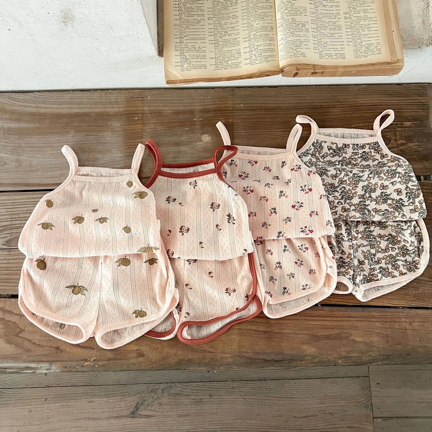 Children's cotton corduroy pajama set with cartoon print in olive, floral, lemon, or peach colours