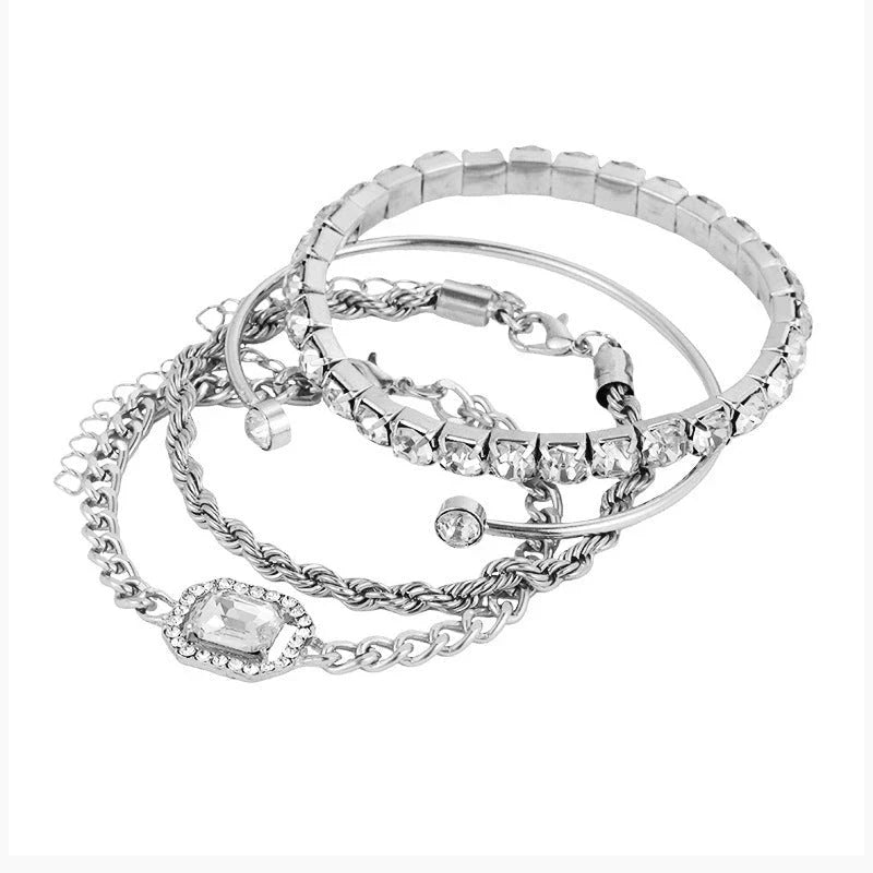 Sparkling crystal bracelets in various geometric designs, adorned with shimmering rhinestones for a luxurious and fashionable accessory