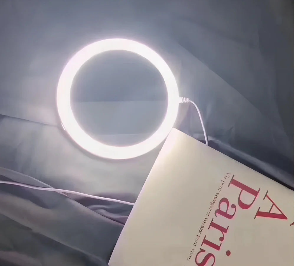 White acrylic double-sided LED vanity mirror showing magnification and normal sides with USB charging port