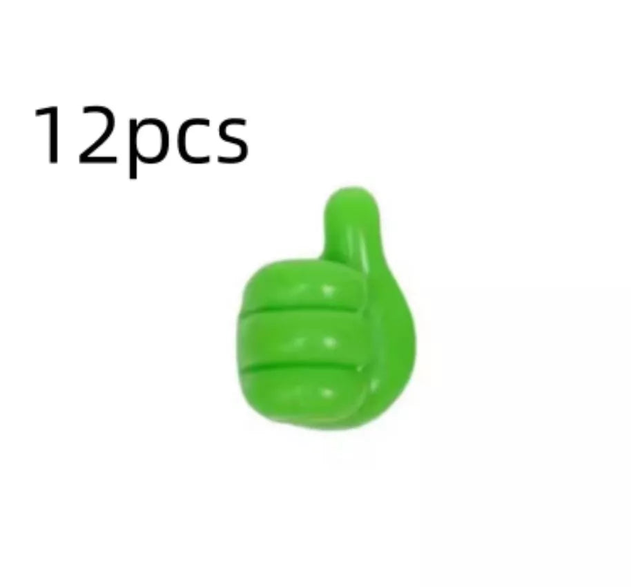 Silicone thumb wall hooks in various colors for organizing kitchen and bathroom items