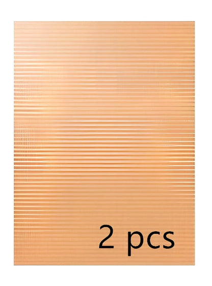 Black and copper braided cable management sleeves showing expandable design for organising wires