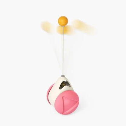 Cat rotating windmill toy with suction base, two transparent bins, blue and yellow-green TPR body.
